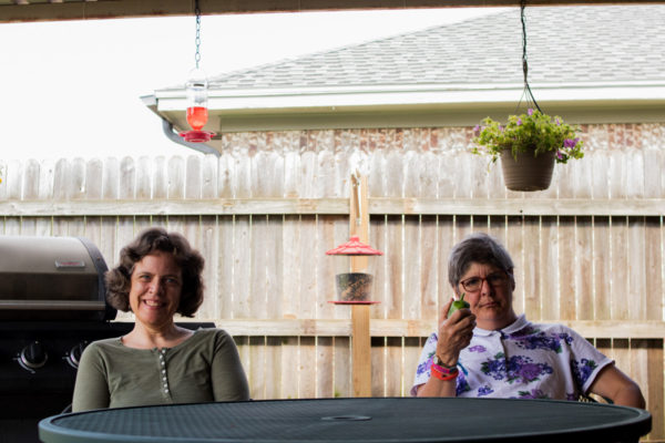 2 women Sitting on the patio