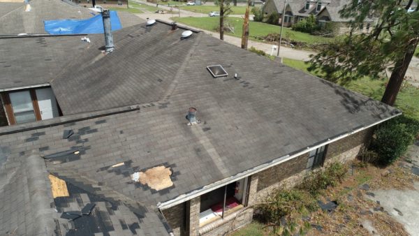 Shingles ripped off rooftop