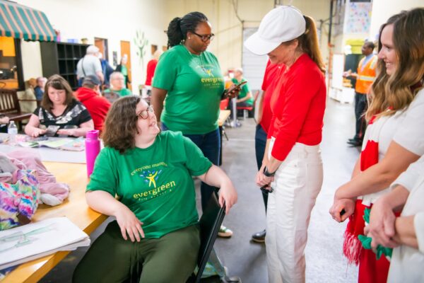 Image at Evergreen with representatives from the Giving Machine