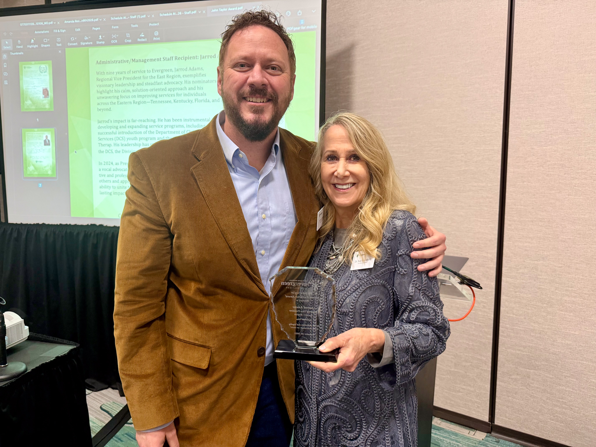 Image from John Taylor Awards (L-R) Jarrod Adams, Regional Vice President, Eastern Division, and Dr. Sue Buchholtz, President/CEO